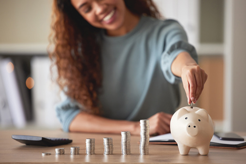 Woman counting pennies
